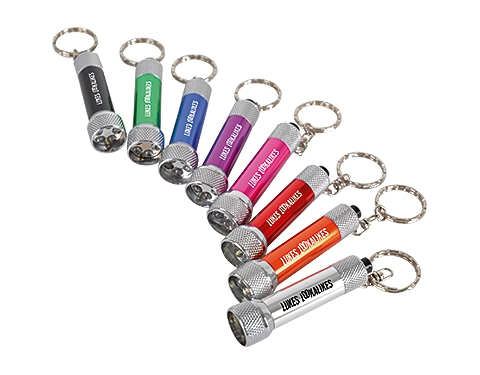a pack of keyring torches on a white surface