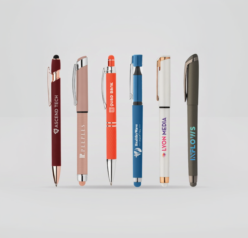 Set of branded pens with various colors and logos on a light gray background
