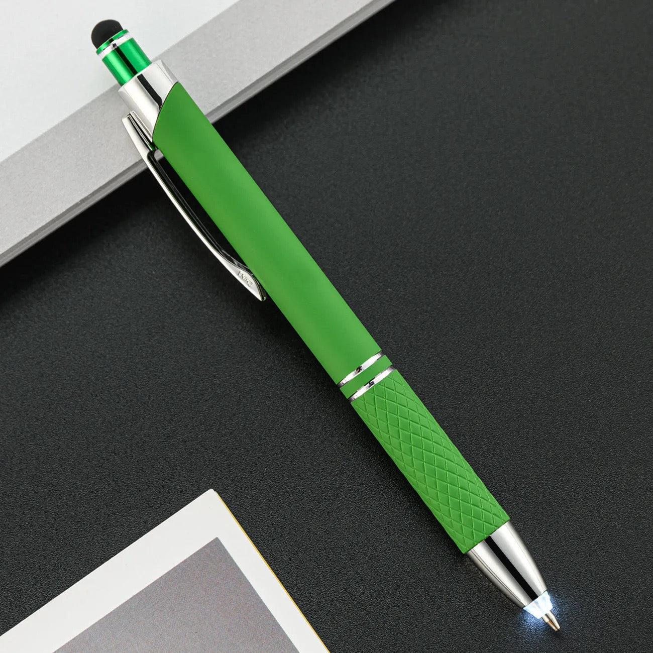 a green barrel pen